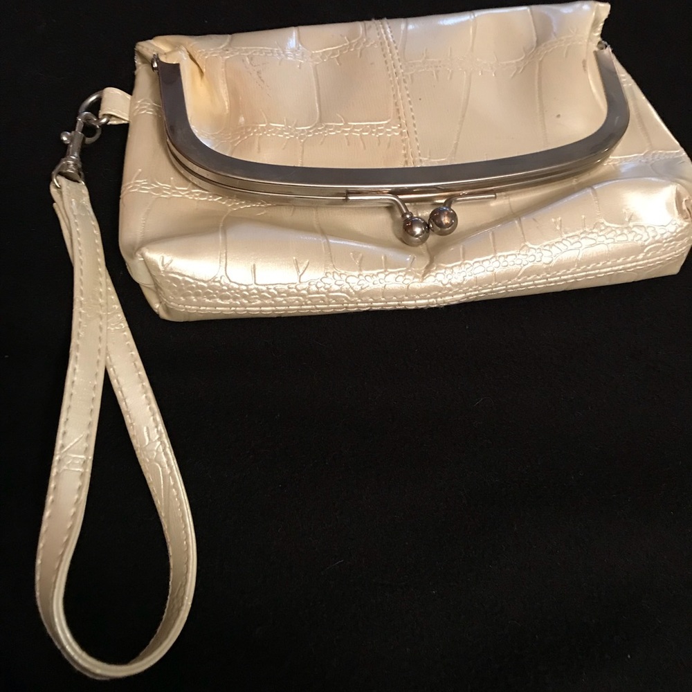 Beige/cream colored wristlet
